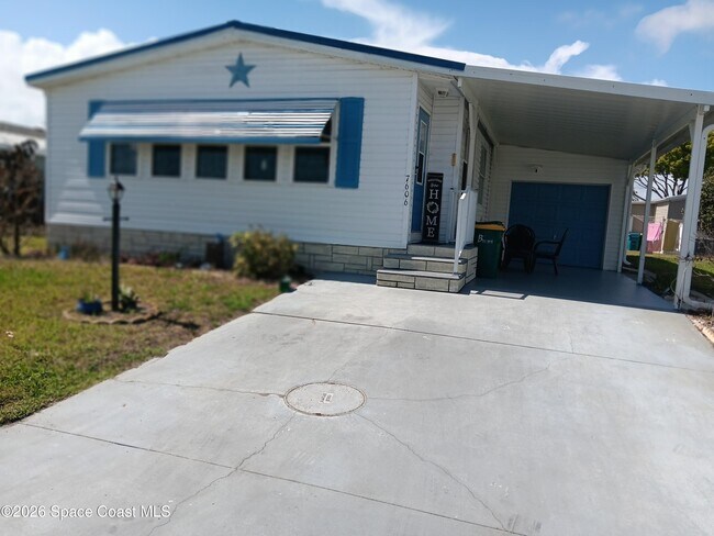7606 Cedar Bark Rd in Micco, FL - Building Photo - Building Photo