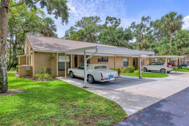 4949 Village Garden Dr in Sarasota, FL - Building Photo - Building Photo