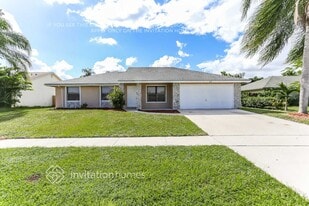 112 La Mancha Ave in Royal Palm Beach, FL - Building Photo