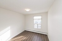 International Ave Apartments in Calgary, AB - Building Photo - Building Photo