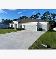 6157 NW Gatun Dr in Port St. Lucie, FL - Building Photo