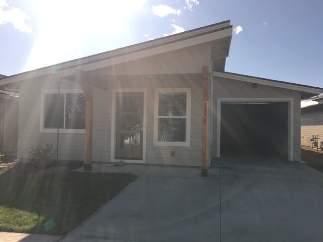 property at 1575 NE Rumgay Ln