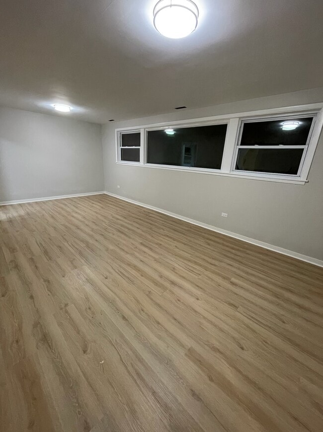 7202 W Crain St, Unit G in Niles, IL - Foto de edificio - Building Photo