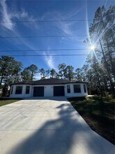 1112 East 12th Street in Lehigh Acres, FL - Foto de edificio - Building Photo