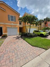 9822 Quinta Artesa Way in Ft. Myers, FL - Foto de edificio - Building Photo