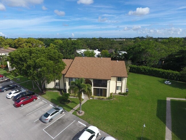 5900 Whispering Pine Way in Greenacres, FL - Building Photo - Building Photo