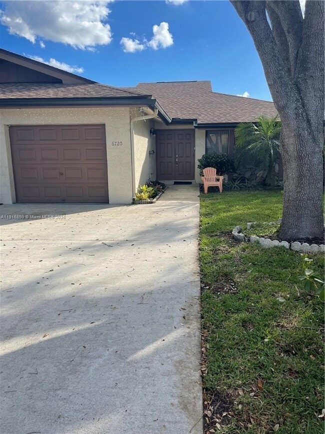 property at 6720 NW 4th Ct