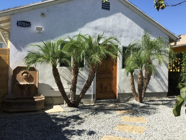 property at 11703 Casimir Ave