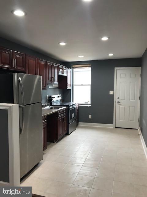 209 N Milton Ave in Baltimore, MD - Building Photo