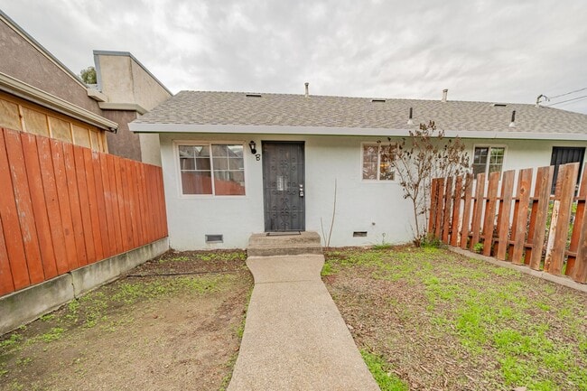 property at 1215 E 5th St