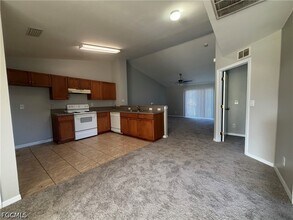704 Gilbert Ave S in Lehigh Acres, FL - Building Photo - Building Photo