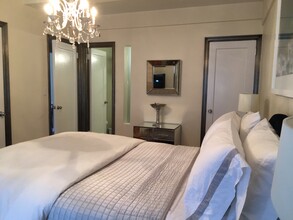 227 E 57th St, Unit 14C in New York, NY - Foto de edificio - Building Photo