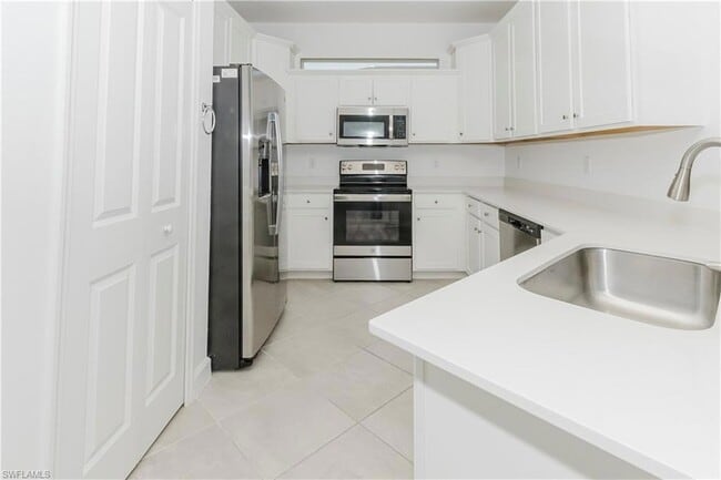 9099 Leatherwood Loop in Lehigh Acres, FL - Building Photo - Building Photo