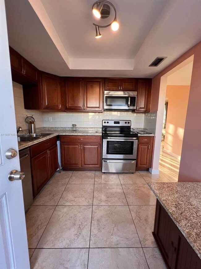 property at 1591 NE Miami Gardens Dr