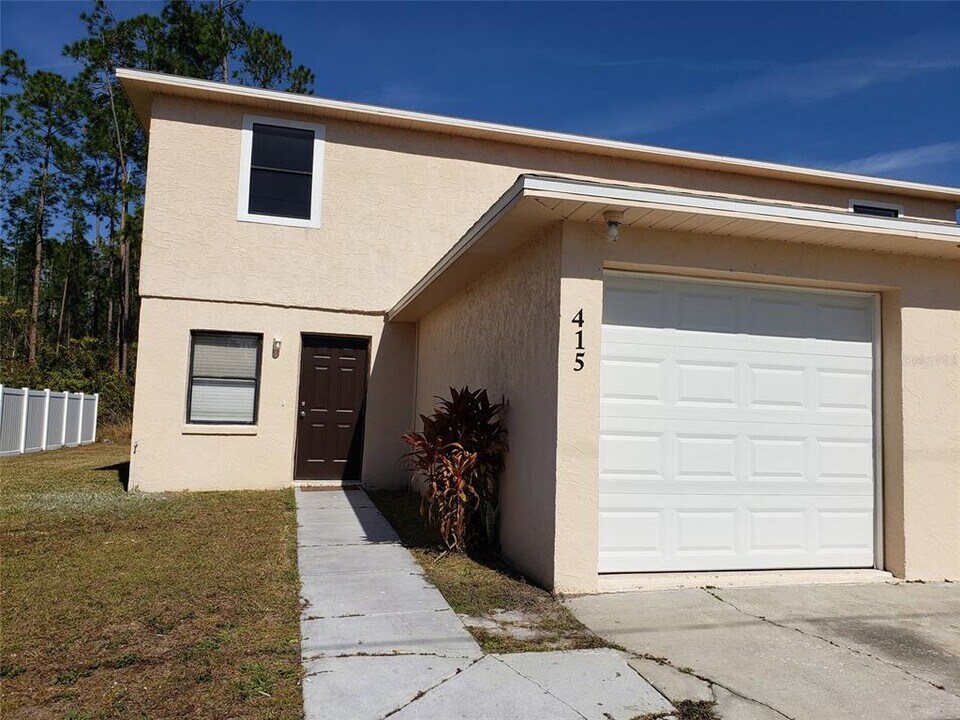 415 Greenwich Ct in Poinciana, FL - Building Photo