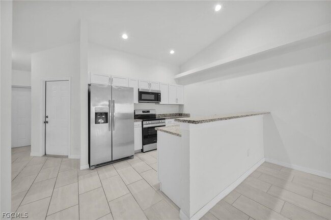 property at 614 SW 3rd Ct