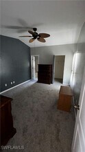 1648 Cheshire Cir W in Lehigh Acres, FL - Building Photo - Building Photo