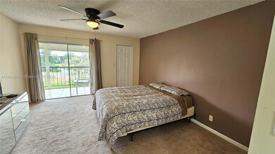 6020 NW 44th St, Unit #407 in Lauderhill, FL - Foto de edificio - Building Photo