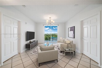 3500 Coral Way, Unit PH-210 in Coral Gables, FL - Building Photo - Building Photo