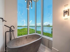 60 Seagate Dr in Naples, FL - Building Photo - Building Photo