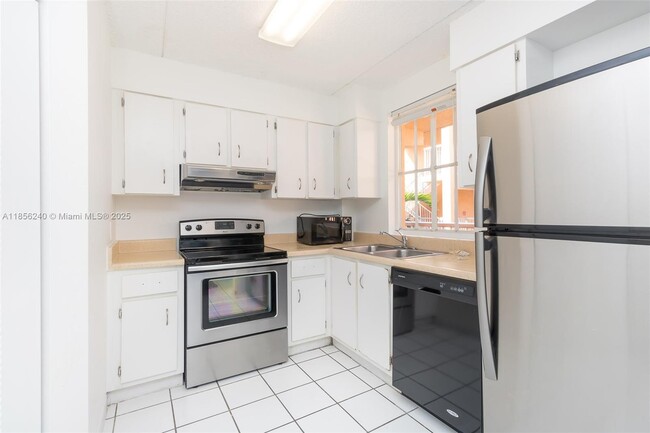 property at 6155 NW 186th St