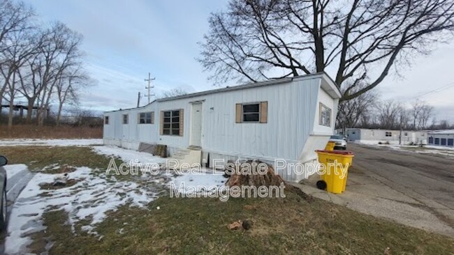 property at 2211 Dort Hwy