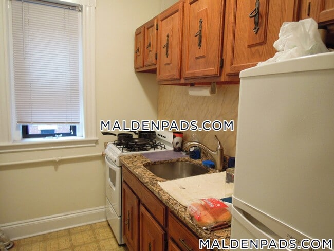 17-19-19 Washington St S, Unit 505 in Malden, MA - Foto de edificio - Building Photo