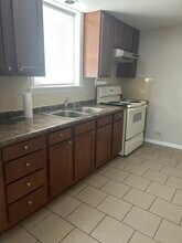 5258 W Henderson St, Unit GDN in Chicago, IL - Foto de edificio - Building Photo