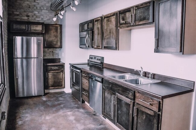 property at 402 E 4th St