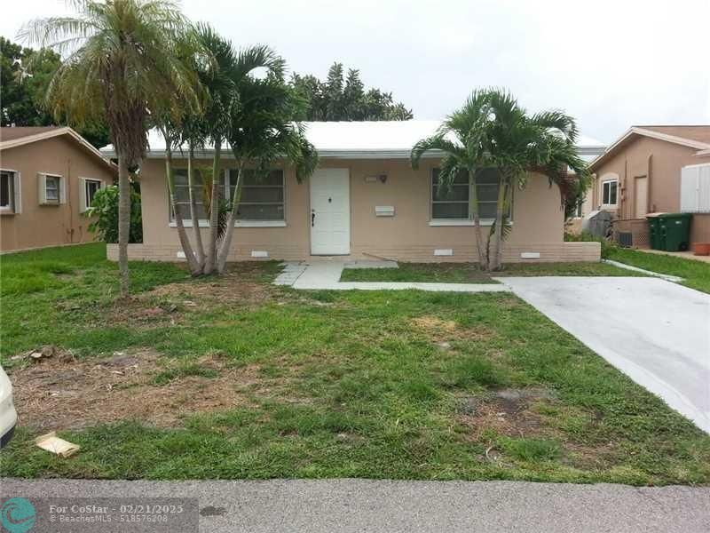 7311 NW 58th St in Tamarac, FL - Building Photo