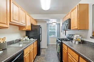 Cedar Gardens and Towers Apartments and Townhomes in Windsor Mill, MD - Building Photo
