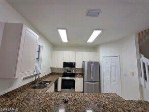 14708 Sutherland Ave in Naples, FL - Building Photo - Building Photo