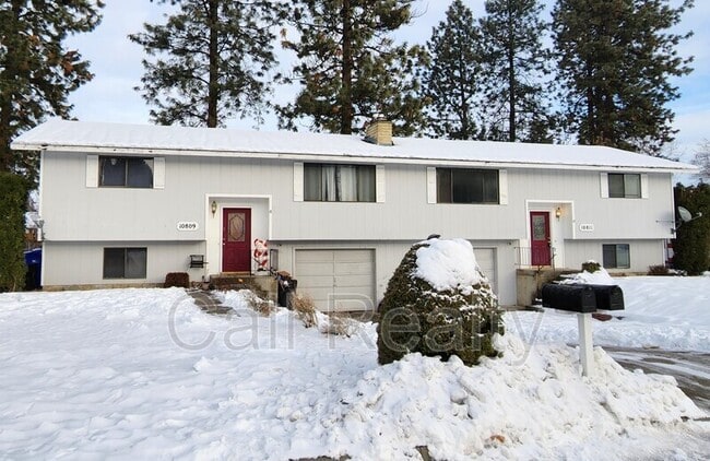 property at 10811 E 26th Ave