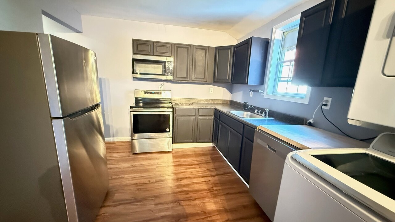 6 -12 Harrison Ave, Unit 12 in Rochester, NH - Building Photo