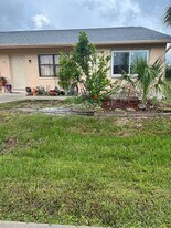77 Boundary Blvd, Unit D in Rotonda West, FL - Building Photo