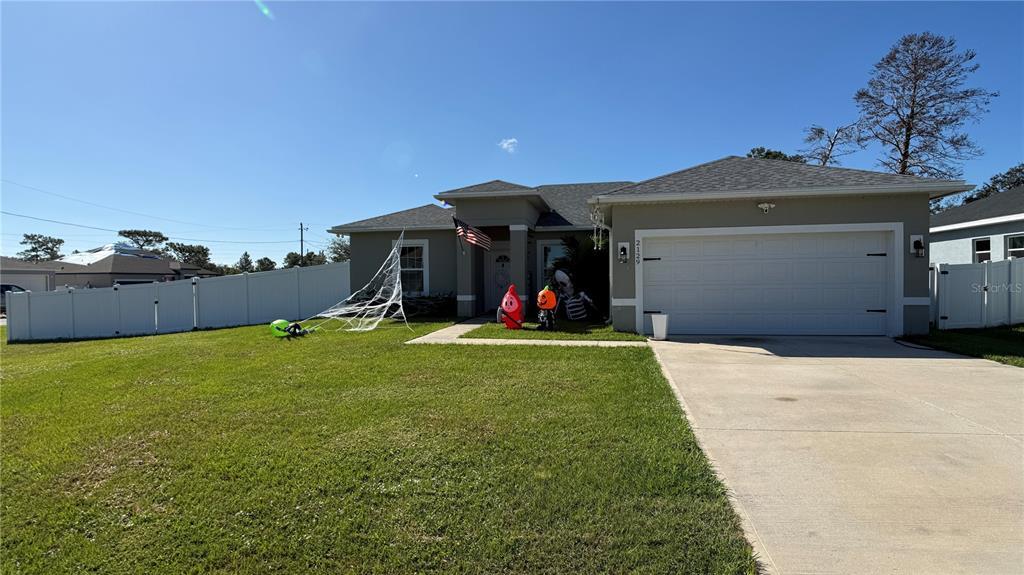 2129 Hibiscus Pl in Poinciana, FL - Building Photo