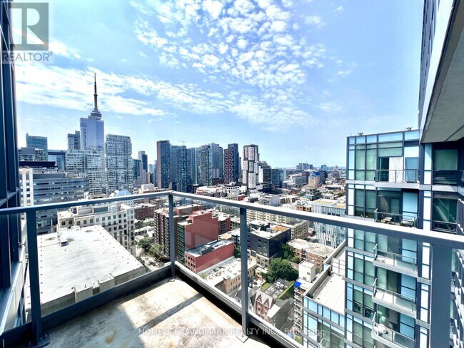 property at 210-2210 Simcoe St