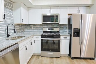 4411 Flakes Mill Rd in Ellenwood, GA - Building Photo - Building Photo