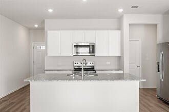 12811 Village Spun Plz in Mustang Ridge, TX - Building Photo - Building Photo