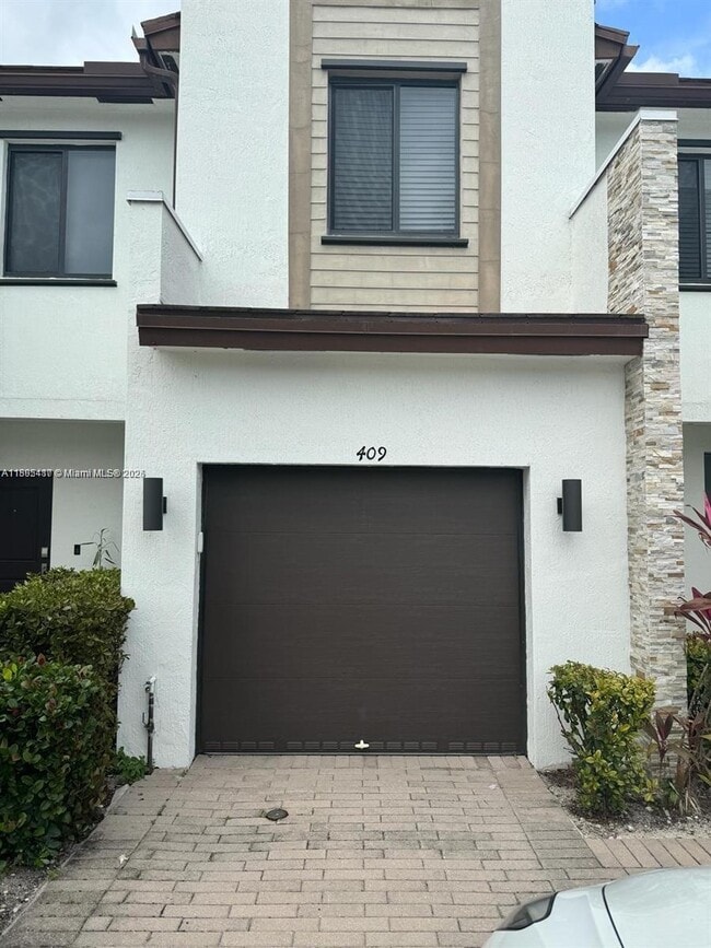 property at 409 NE 208th Terrace