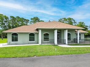 6651 Seminole Pratt Whitney Rd in The Acreage, FL - Foto de edificio - Building Photo