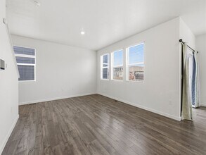 Beautiful Home in Severance with 3-Car Garage, Fenced Yard, and Central A/C! in Severance, CO - Building Photo - Building Photo