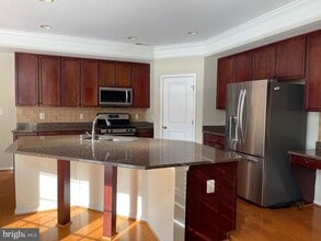 12313 Tanalian Falls Ln in Linton Hall, VA - Building Photo - Building Photo