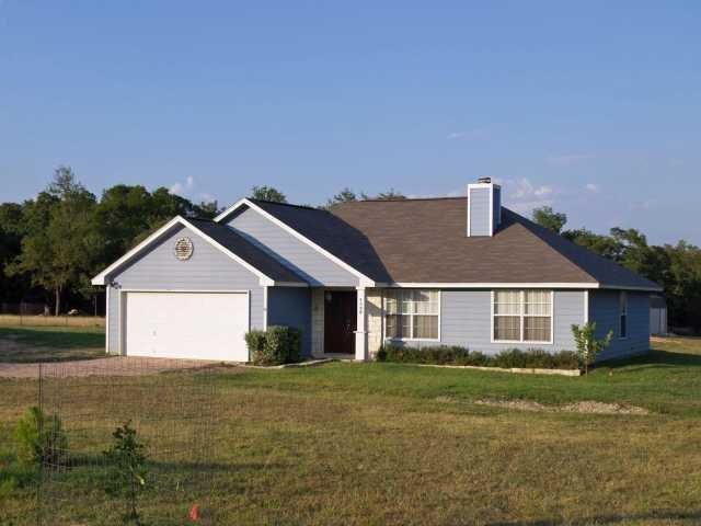 1320 Springlake Dr in Dripping Springs, TX - Building Photo