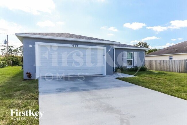 1430 SW Santiago Ave in Port St. Lucie, FL - Building Photo - Building Photo