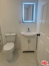 4013 Walton Ave in Los Angeles, CA - Building Photo - Building Photo