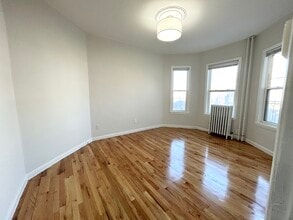 153 E Cottage St, Unit #1 in Boston, MA - Building Photo - Building Photo