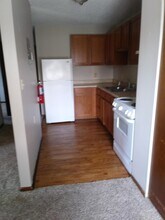 709 John Goodhue Dr, Unit 10 in Carlisle, IA - Foto de edificio - Building Photo