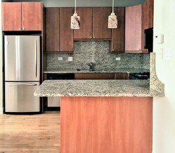 624 W Roscoe St, Unit 1N in Chicago, IL - Foto de edificio - Building Photo