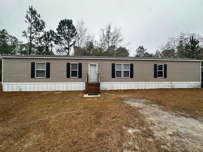 property at 124 Mallet Bayou Rd